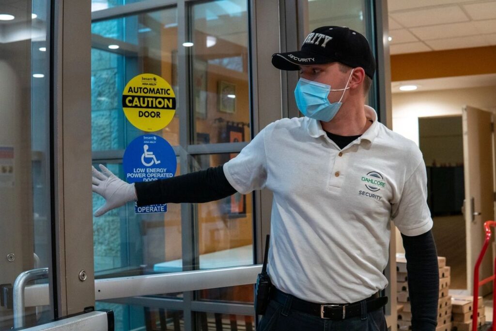 Replace with a photo of a Dahlcore guard or hospital lobby